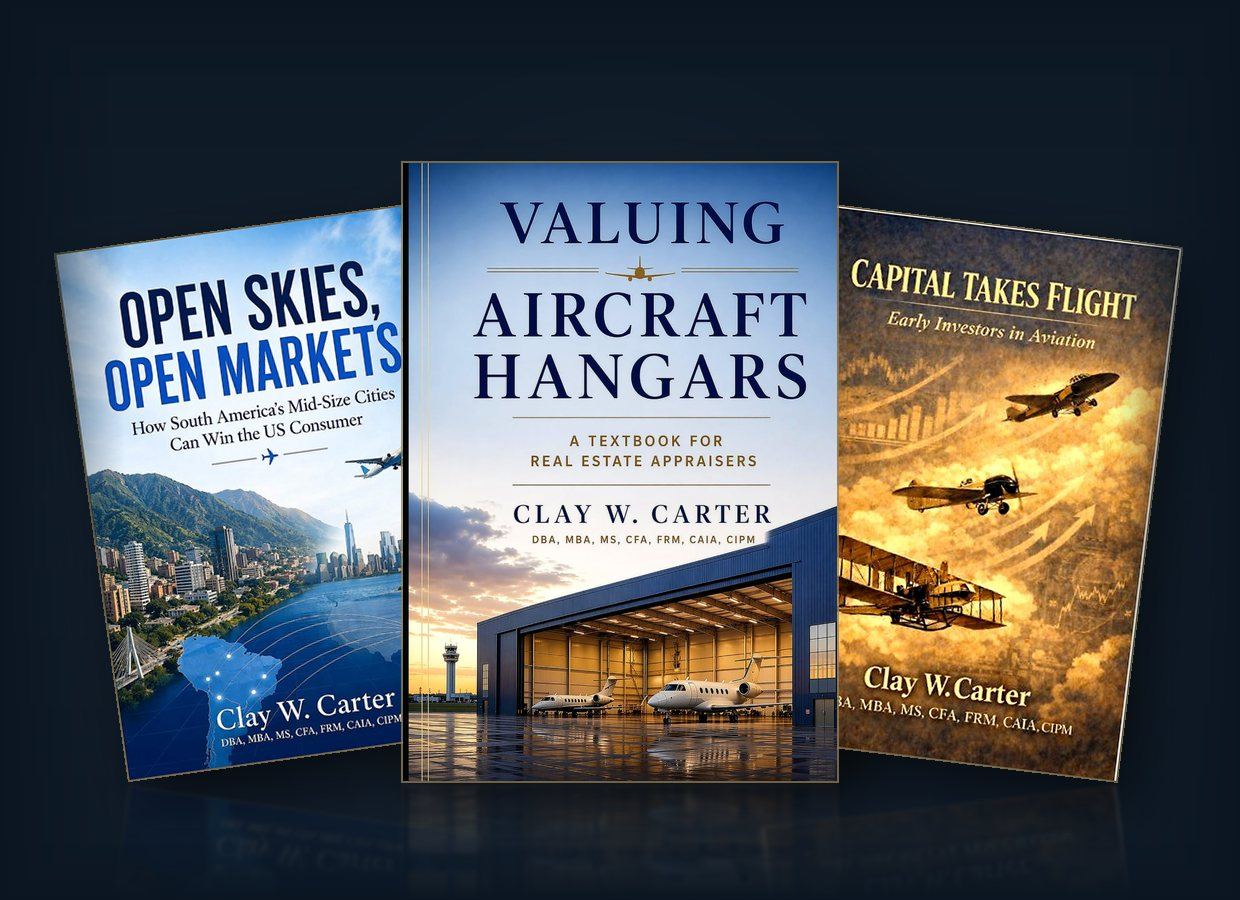 The three books by Dr. Clay W. Carter standing together: Valuing Aircraft Hangars, Open Skies Open Markets, and Capital Takes Flight